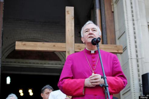 London, UK. 06 April, 2012. Archbishop of Westminster, Vincent Nichols, speaking outside  Westminster Cathedral at the Good Friday Procession of Witness in London. The procession made its way from Methodist Central Hall, to Westminster Cathedral then to W